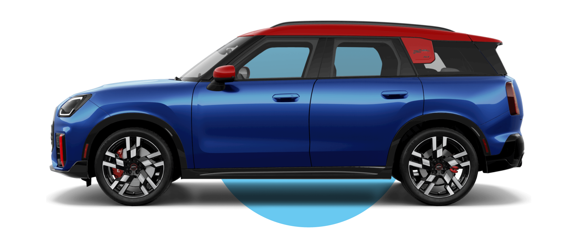 Side view of a MINI JCW Countryman ALL4 in the Blazing Blue body color, facing left with its shadow underneath it.