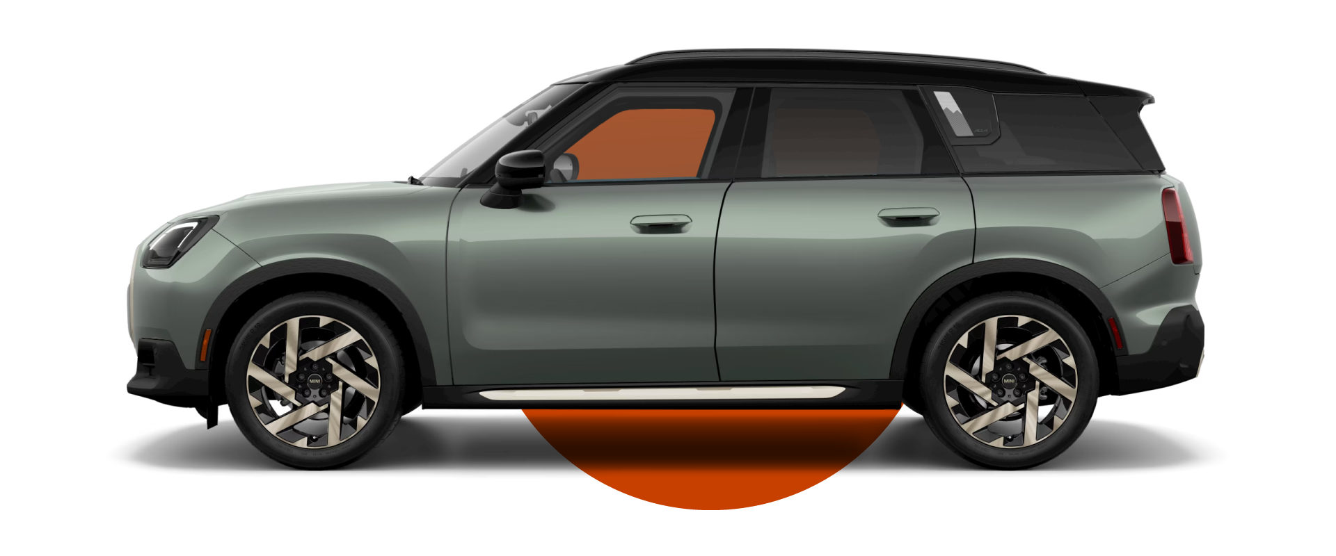 Side view of a MINI Countryman S ALL4 in the Smokey Green body color, facing left with its shadow underneath it