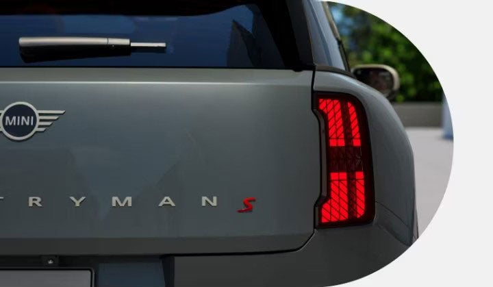 Back view of a MINI Countryman S ALL4, with a focus on the trunk and right taillight.